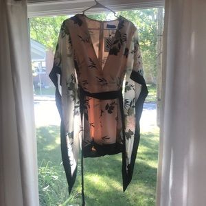 Kimono style romper tags still on